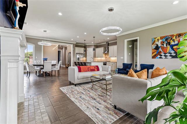 Professionally photographed open living and kitchen area